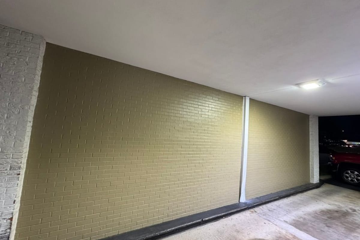 Painted brick drive-through walls and freshly cleaned concrete